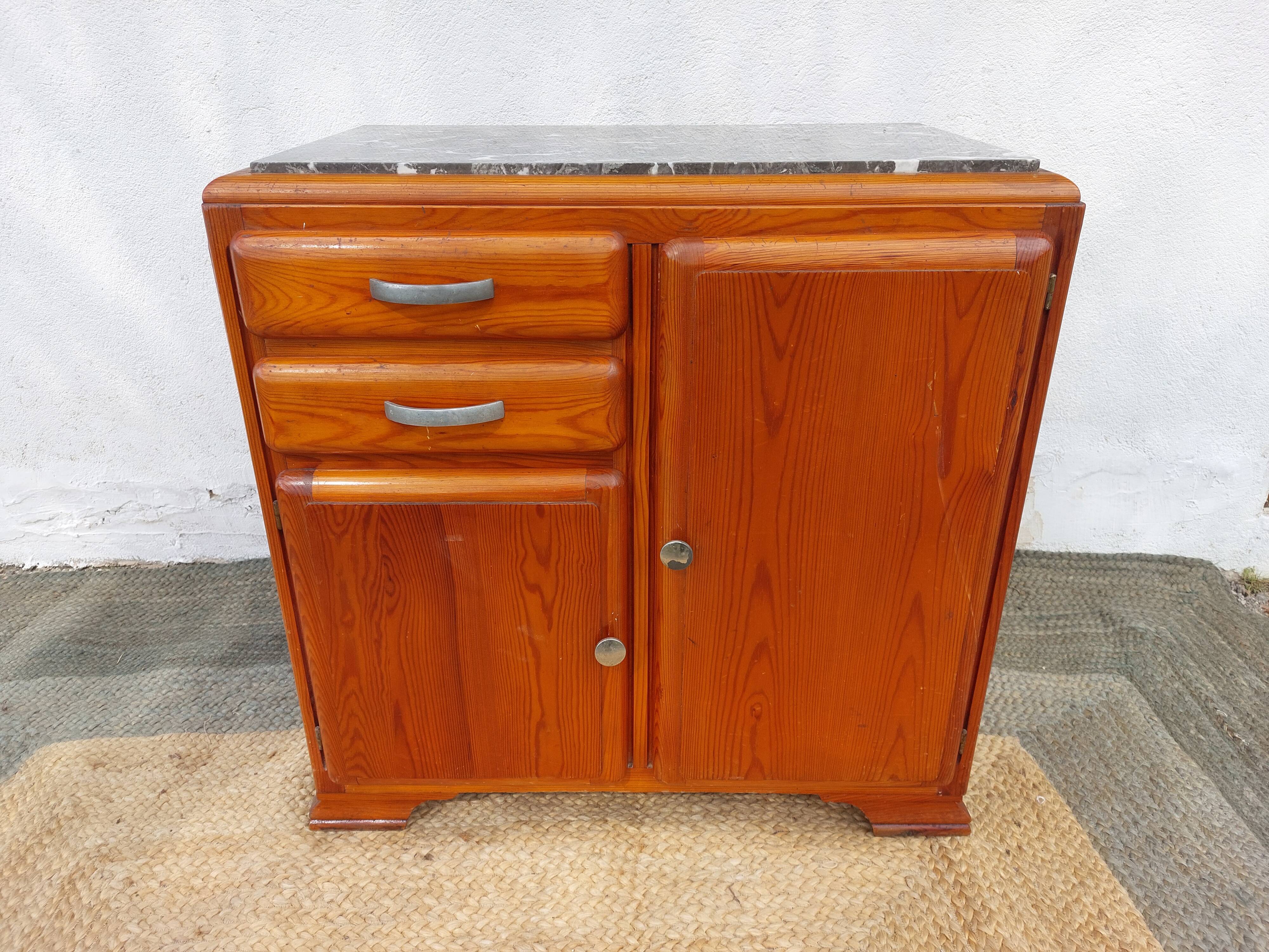 Mado buffet, marble top and asymmetrical doors.