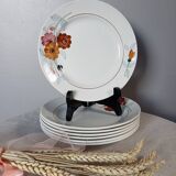 7 flowered dessert plates, St Amand factory, 1930