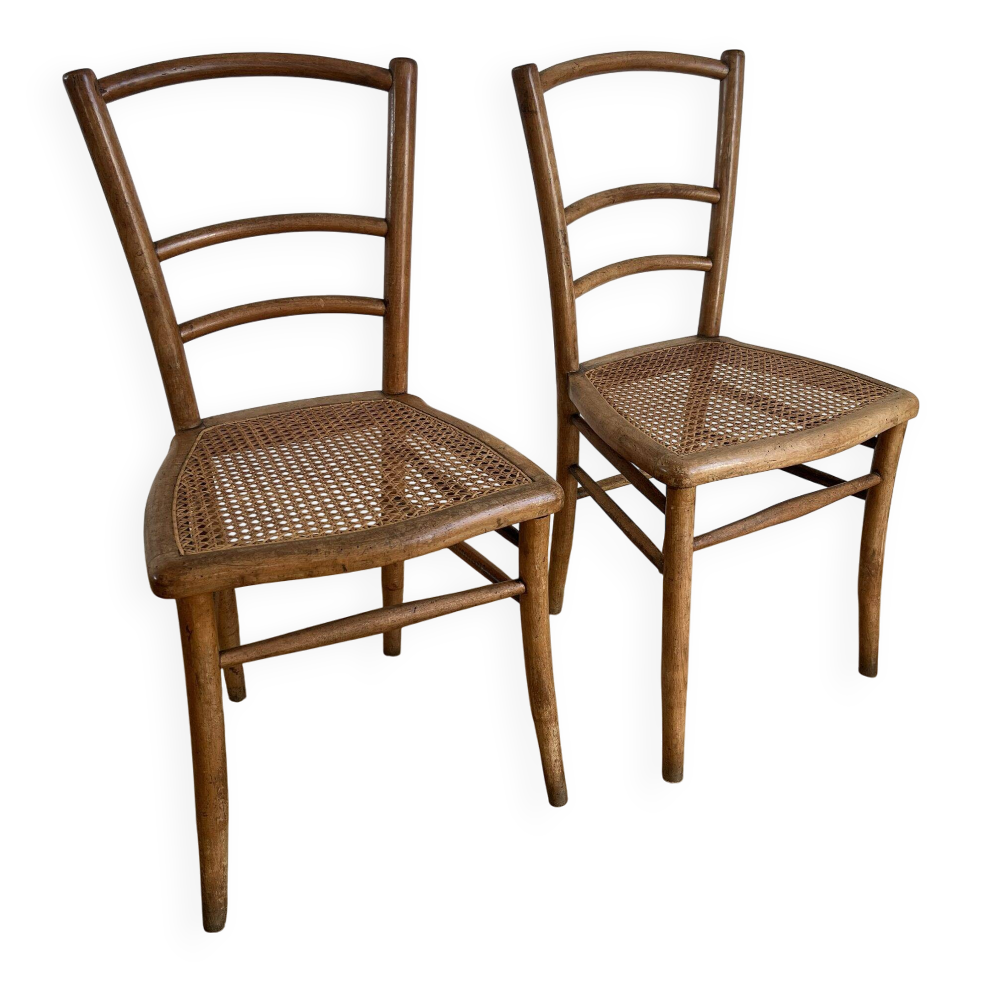 Pair of caned bistro chairs