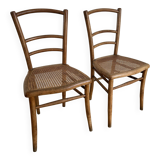 Pair of caned bistro chairs