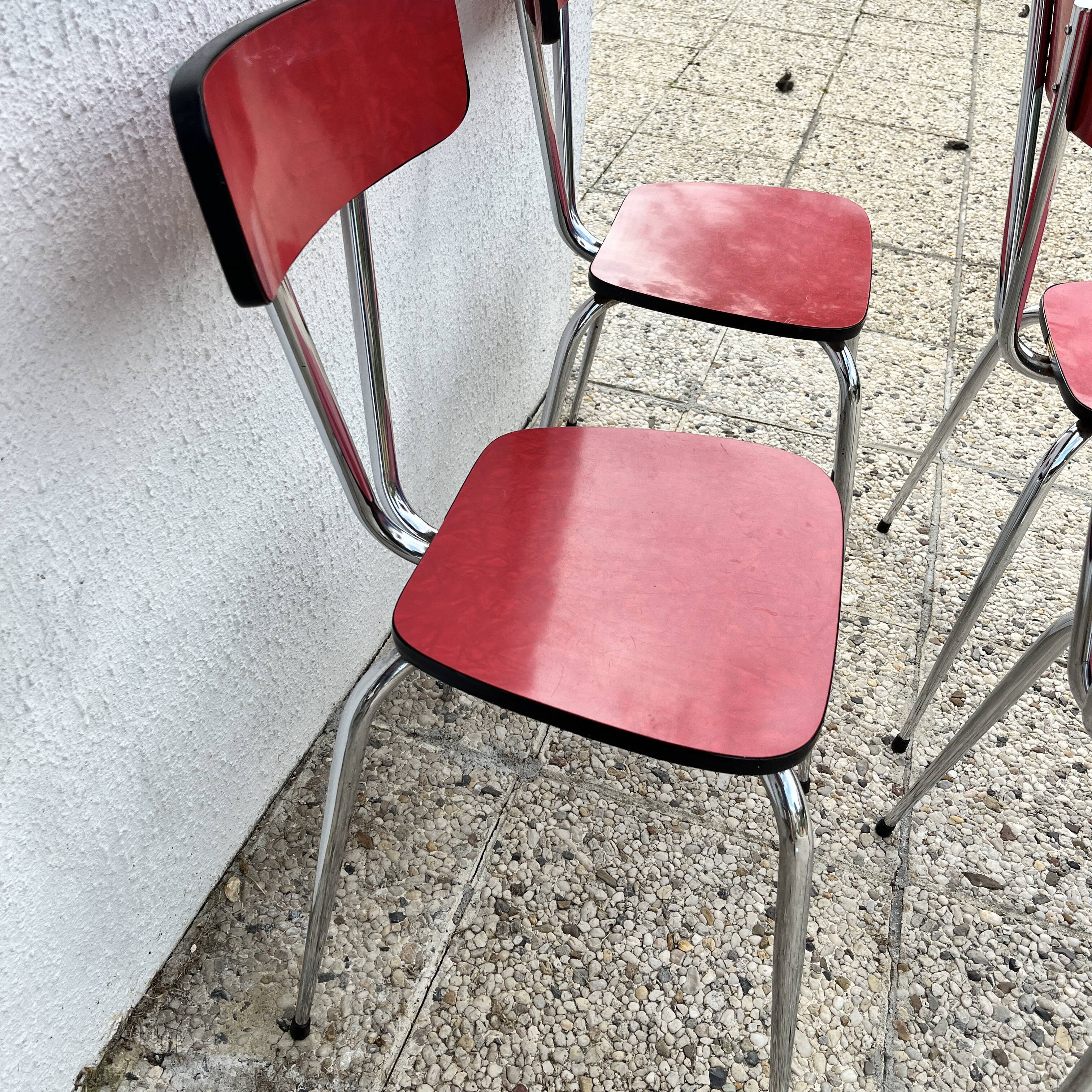 Chairs in formica red foot compass