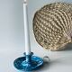 Old enamelled metal candlestick