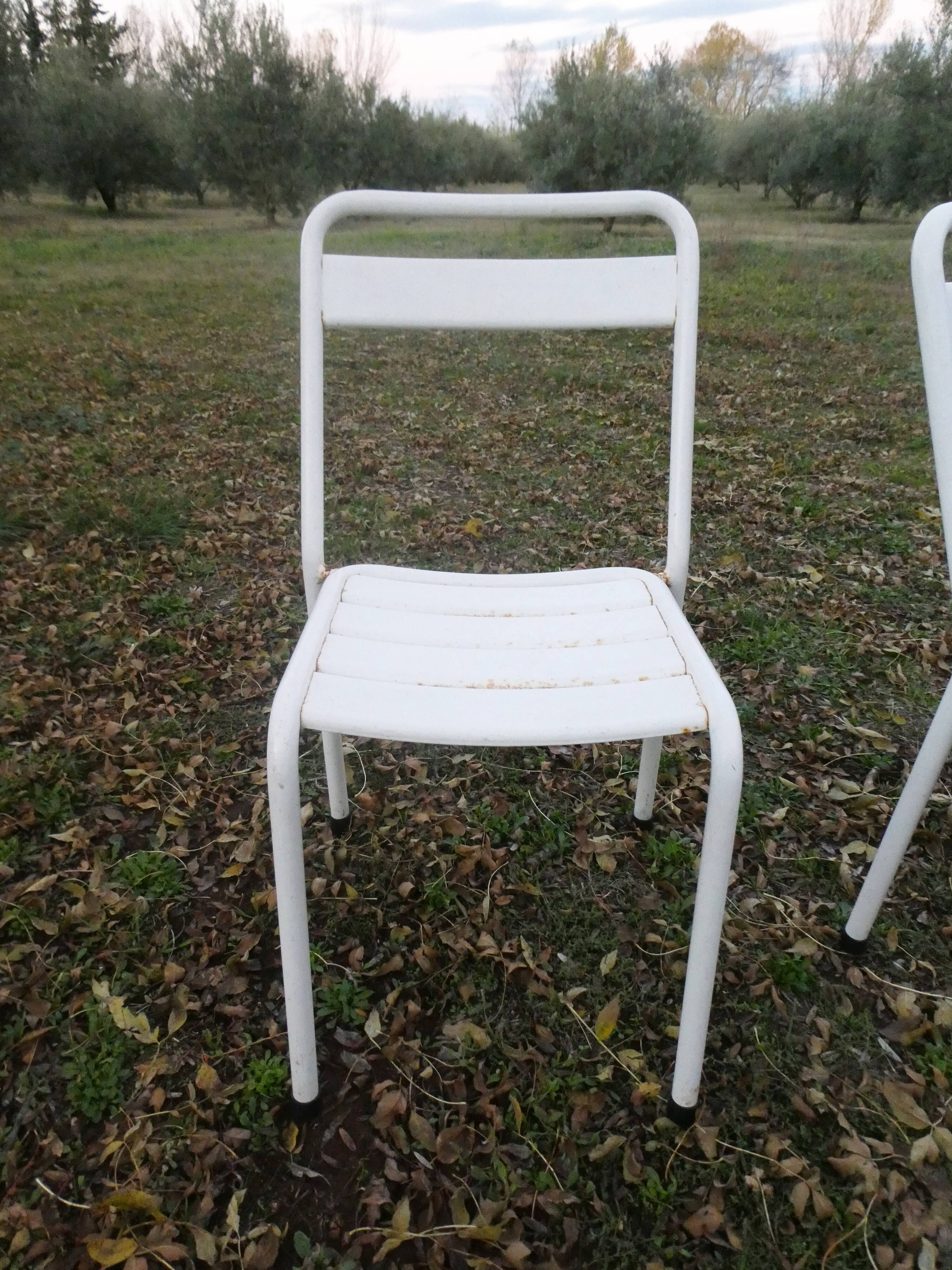 Duo of bistro style indus terrace chairs