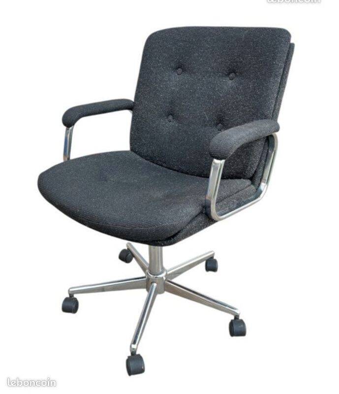 Black mottled fabric and chrome swivel armchair, 1