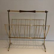 Brass and wood magazine rack, in the style of Cesare Lacca.