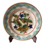 Old barbotine dessert plate. Floral patterns