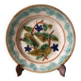 Old barbotine dessert plate. Floral patterns