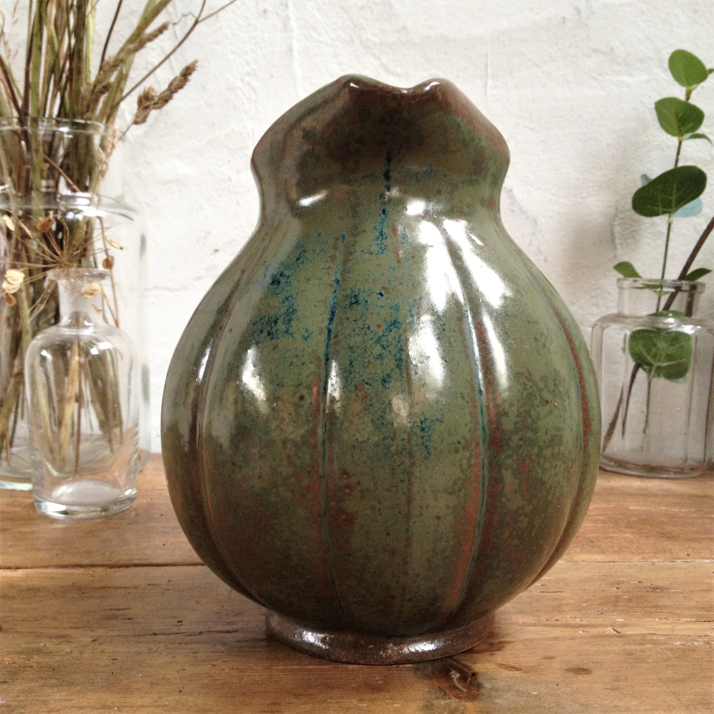 Green enamelled sandstone pitcher
