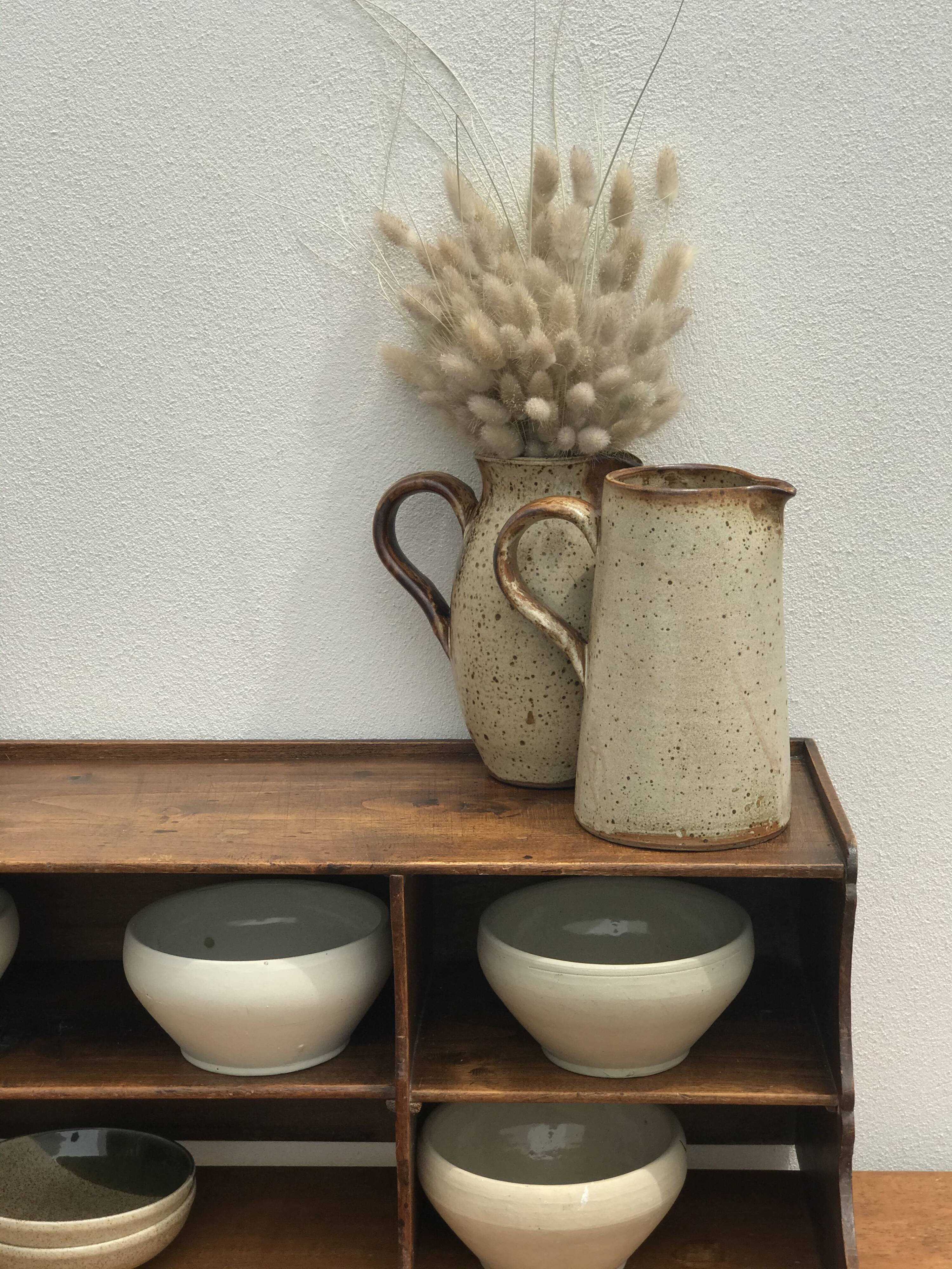 Pair of sandstone pitchers