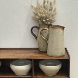 Pair of sandstone pitchers