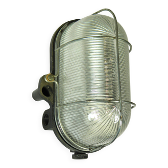 Glass and Bakelite wall light from the 1950s.