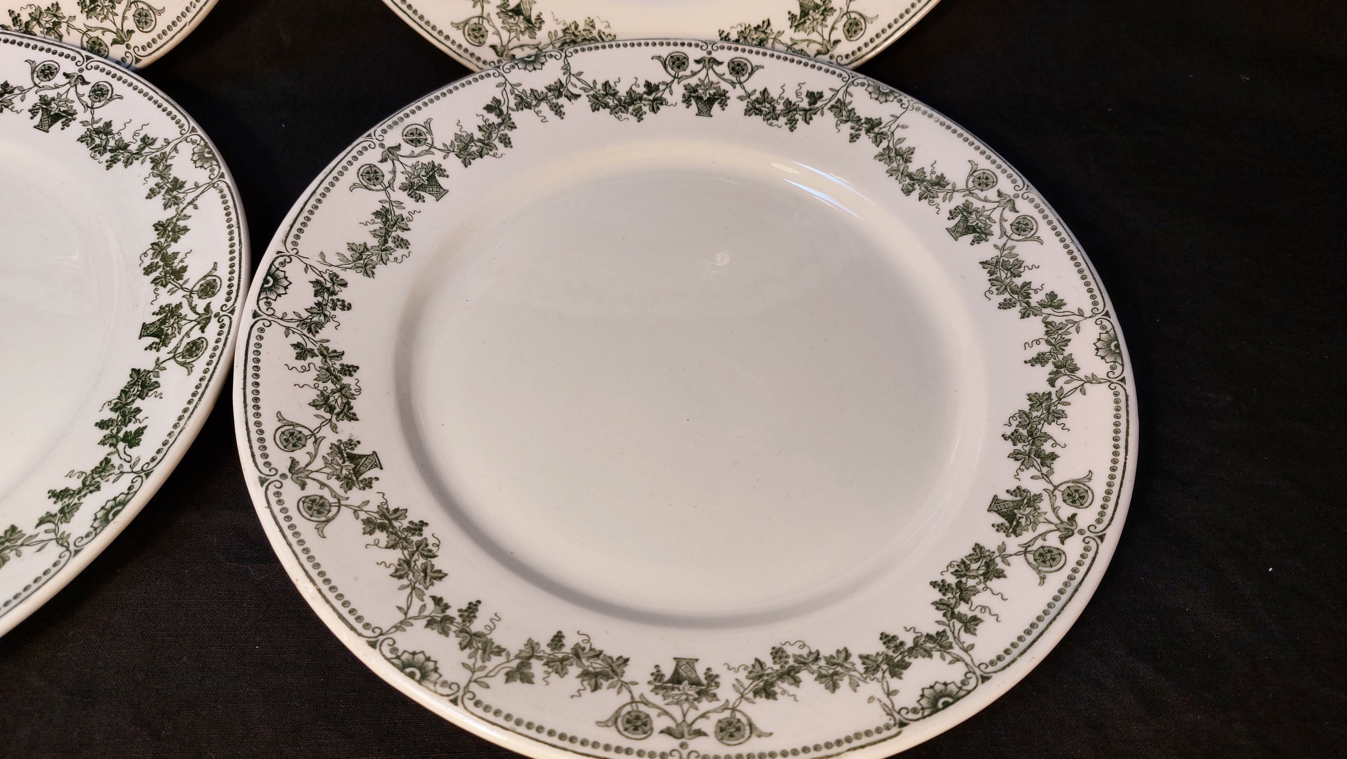 Set of 4 antique flat plates in half-porcelain from Badonviller