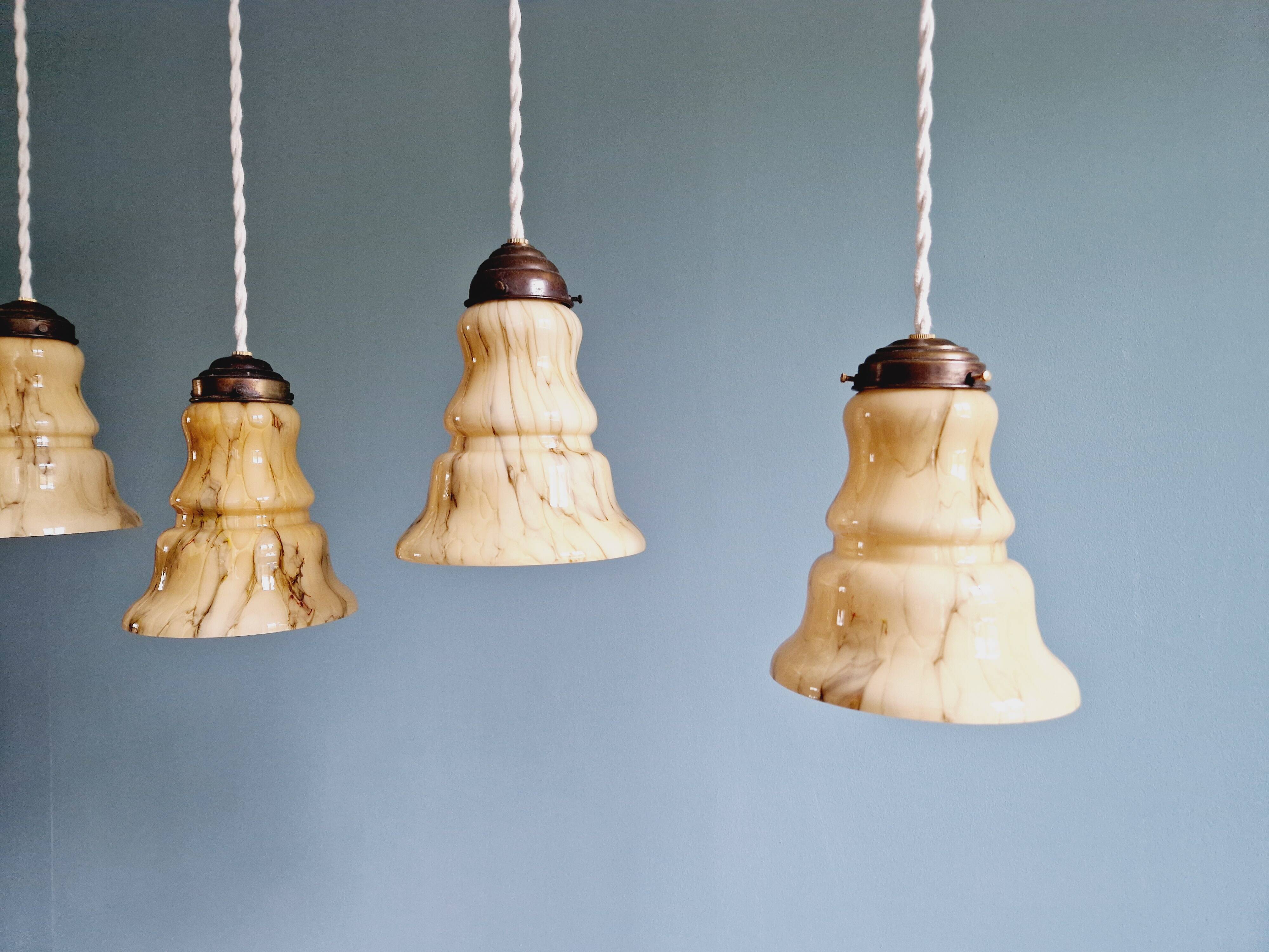 Set of 3 Art Deco marbled opaline pendant lights, 1920s-30s