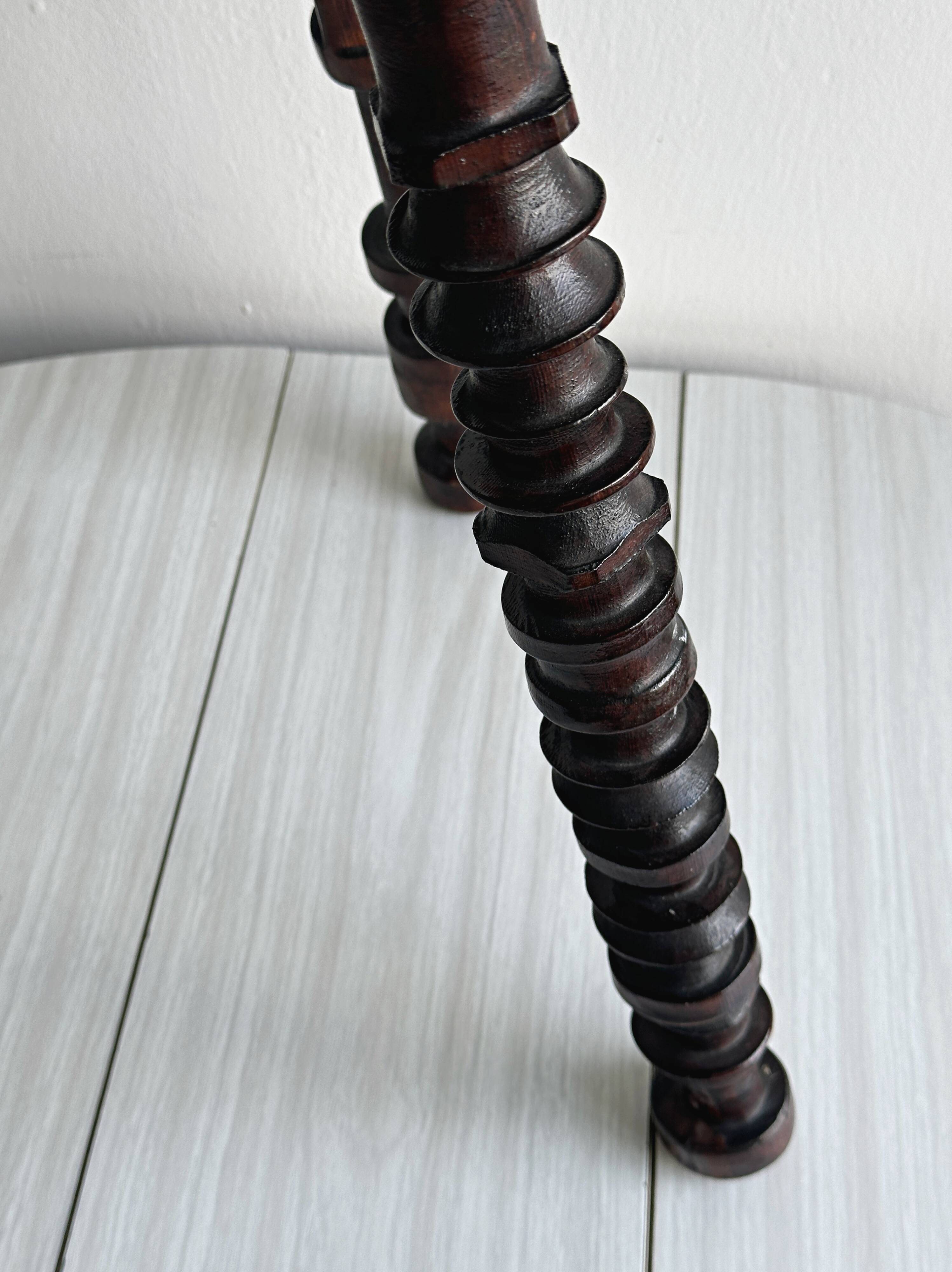 Antique dark wood tripod stool