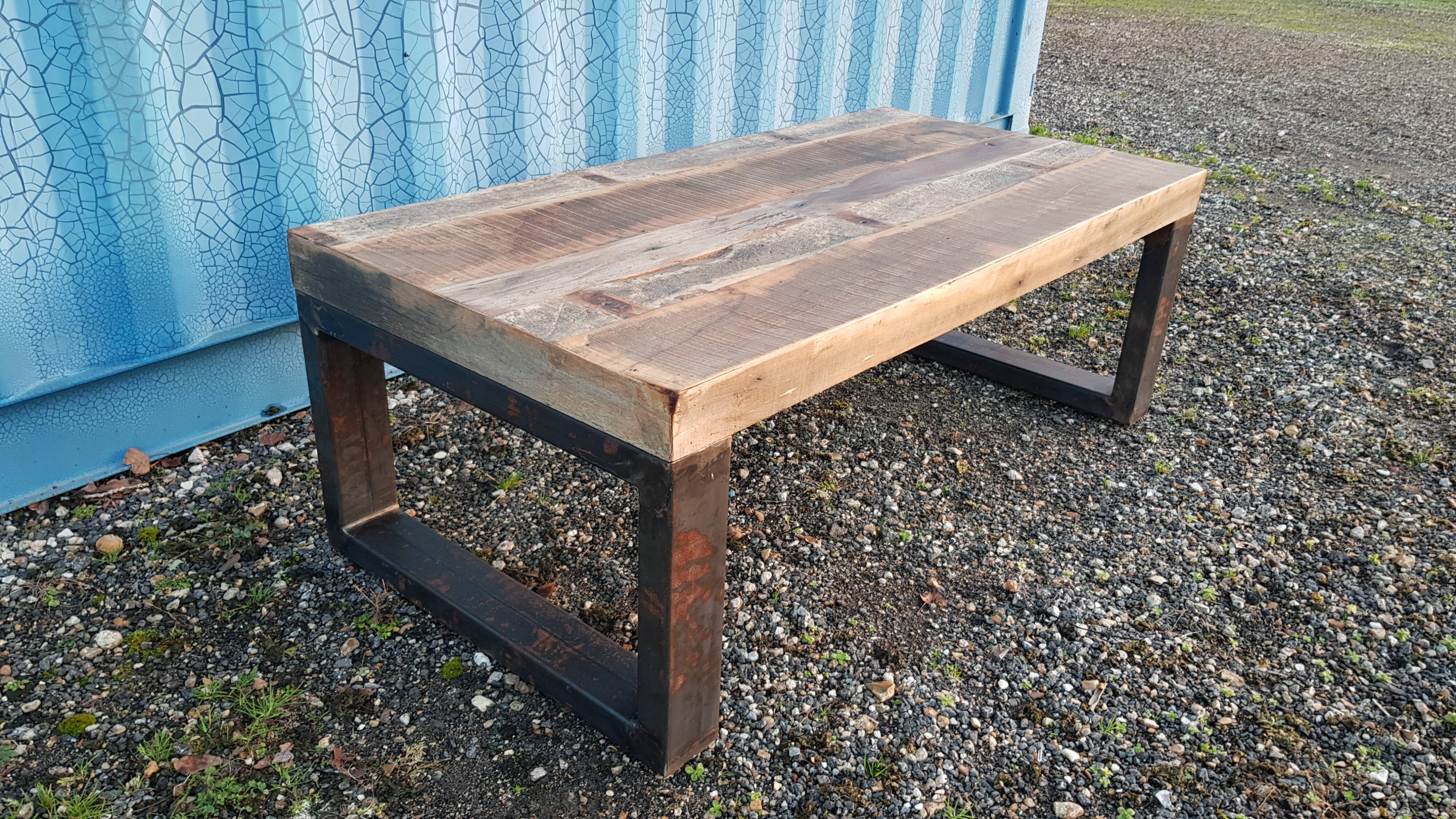Industrial coffee table with wooden top and metal legs