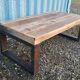Industrial coffee table with wooden top and metal legs