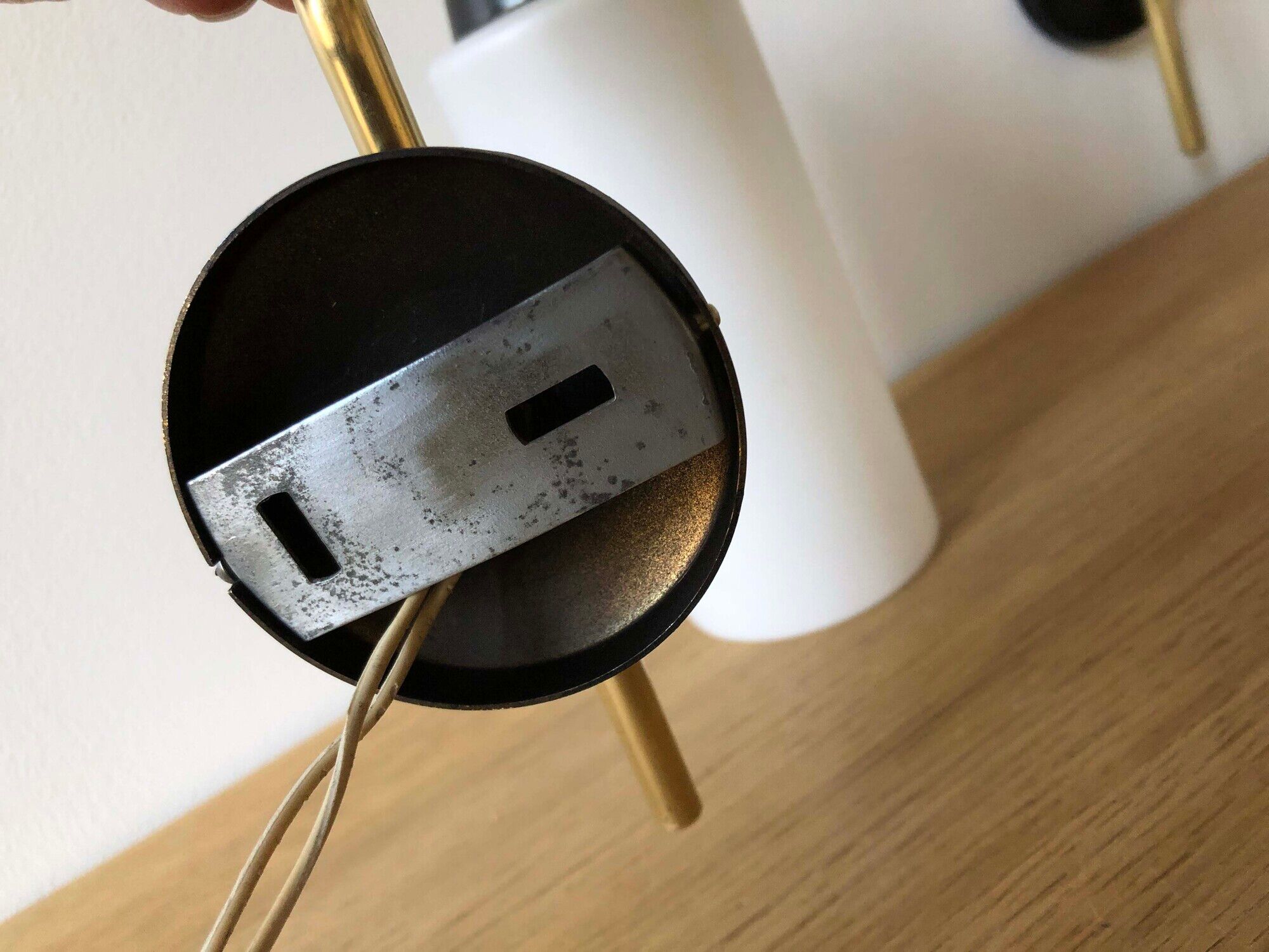 Pair of brass tube wall light and 1960s opalin glass