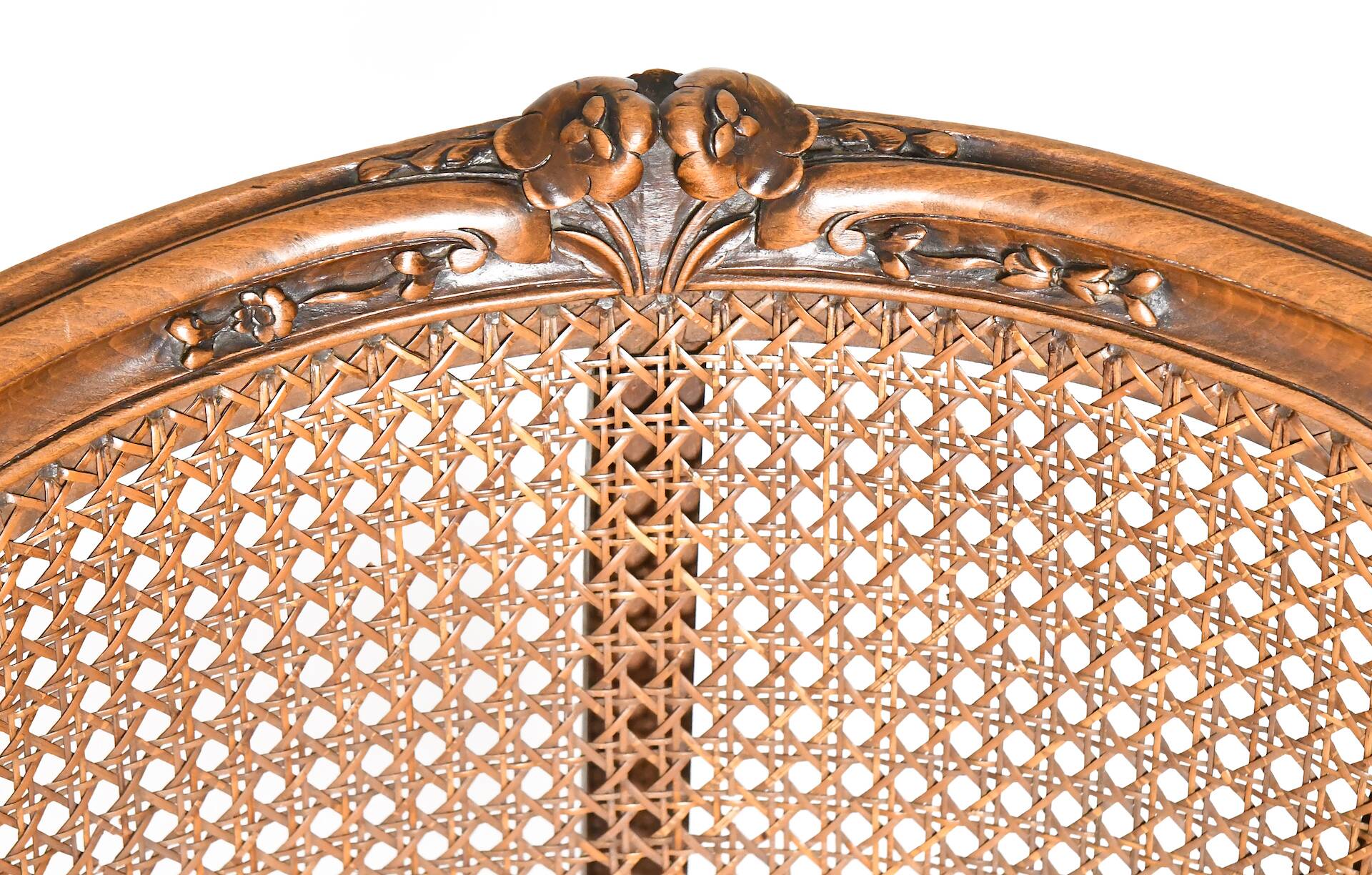 Louis XV style caned bergère armchair