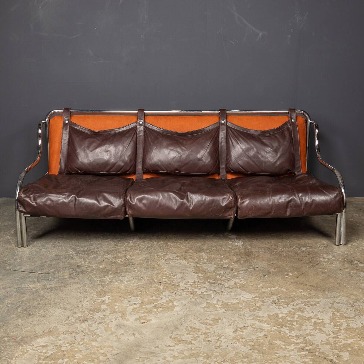 A 20thc italian brown leather sofa by gae aulenti for poltronova c.1962
