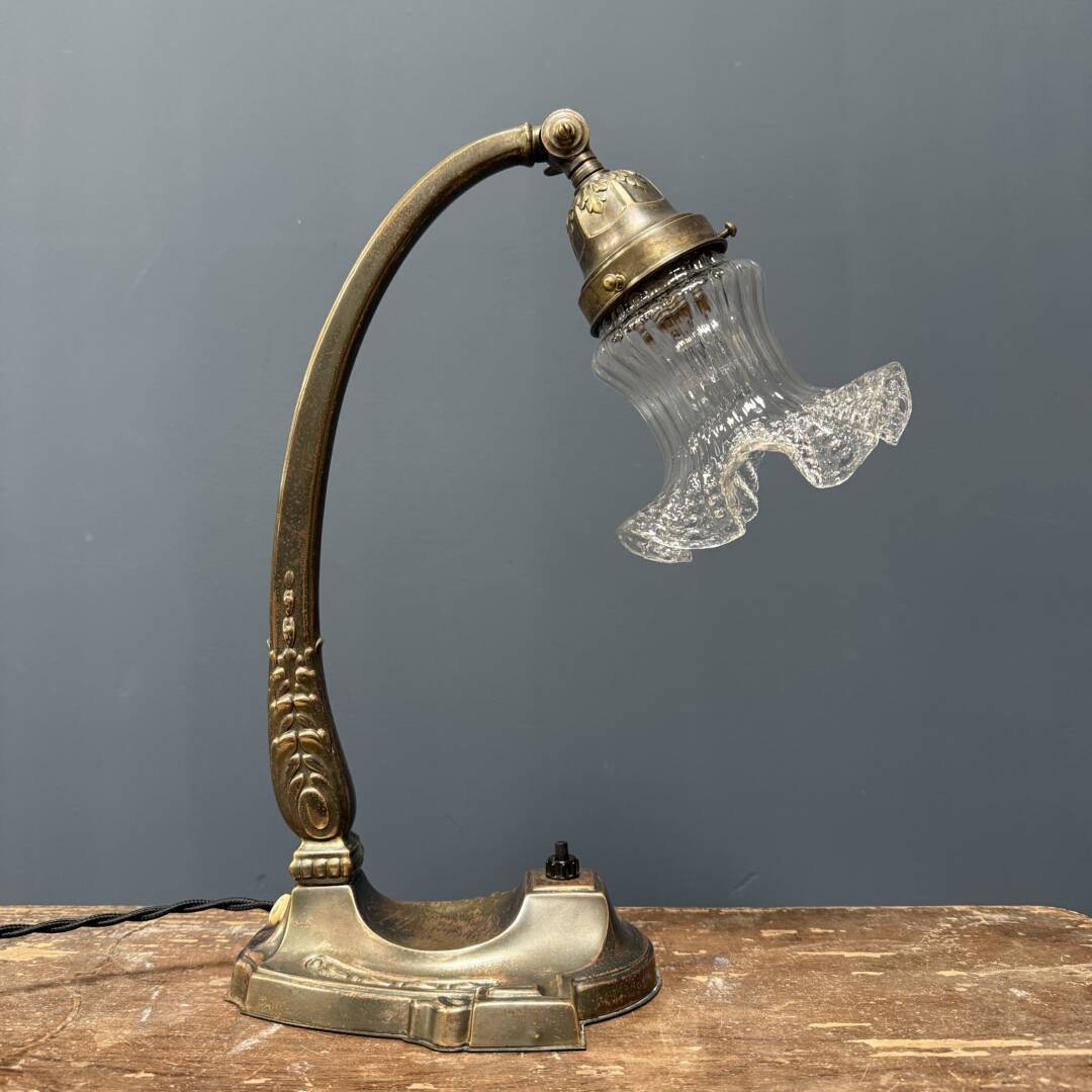 French art nouveau table lamp with transparent glass shade
