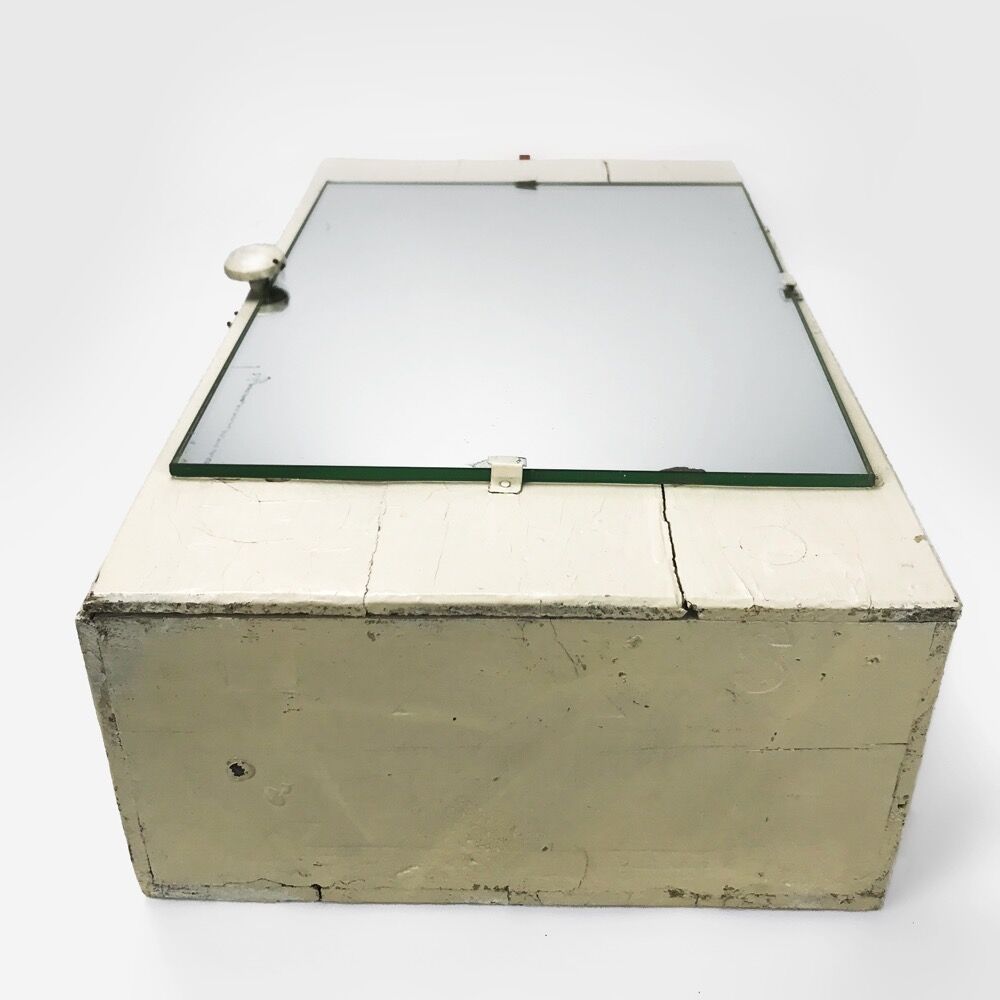 Old medicine cabinet with mirror