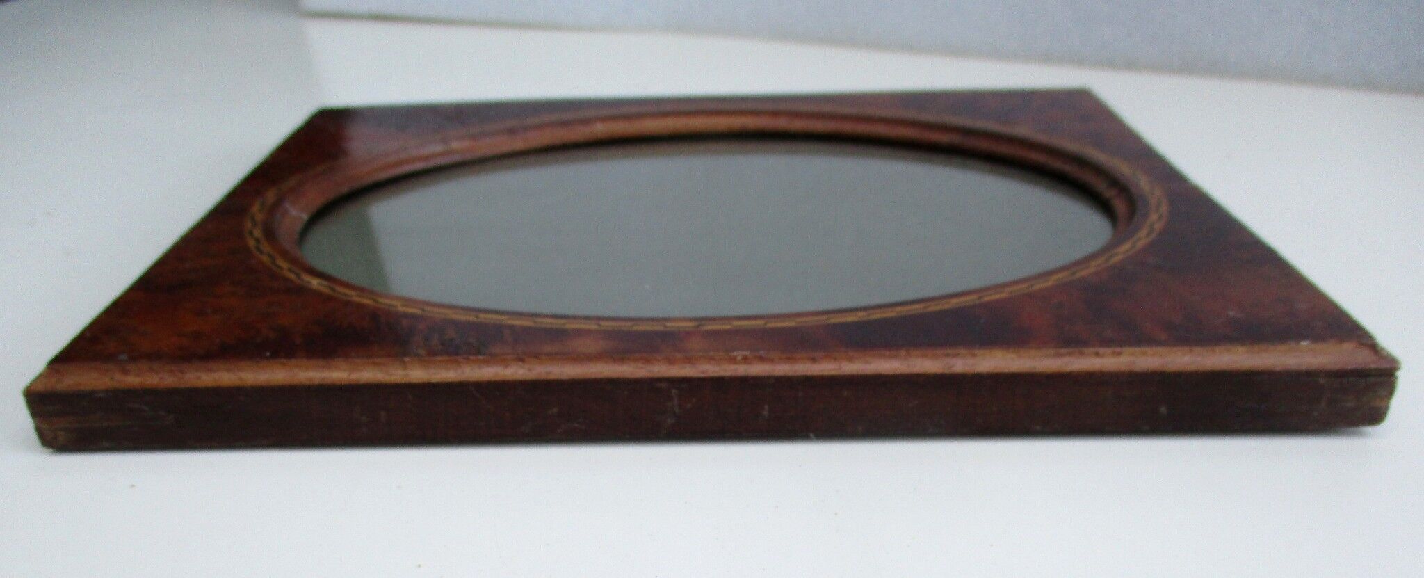 Encadrement en loupe et marqueterie