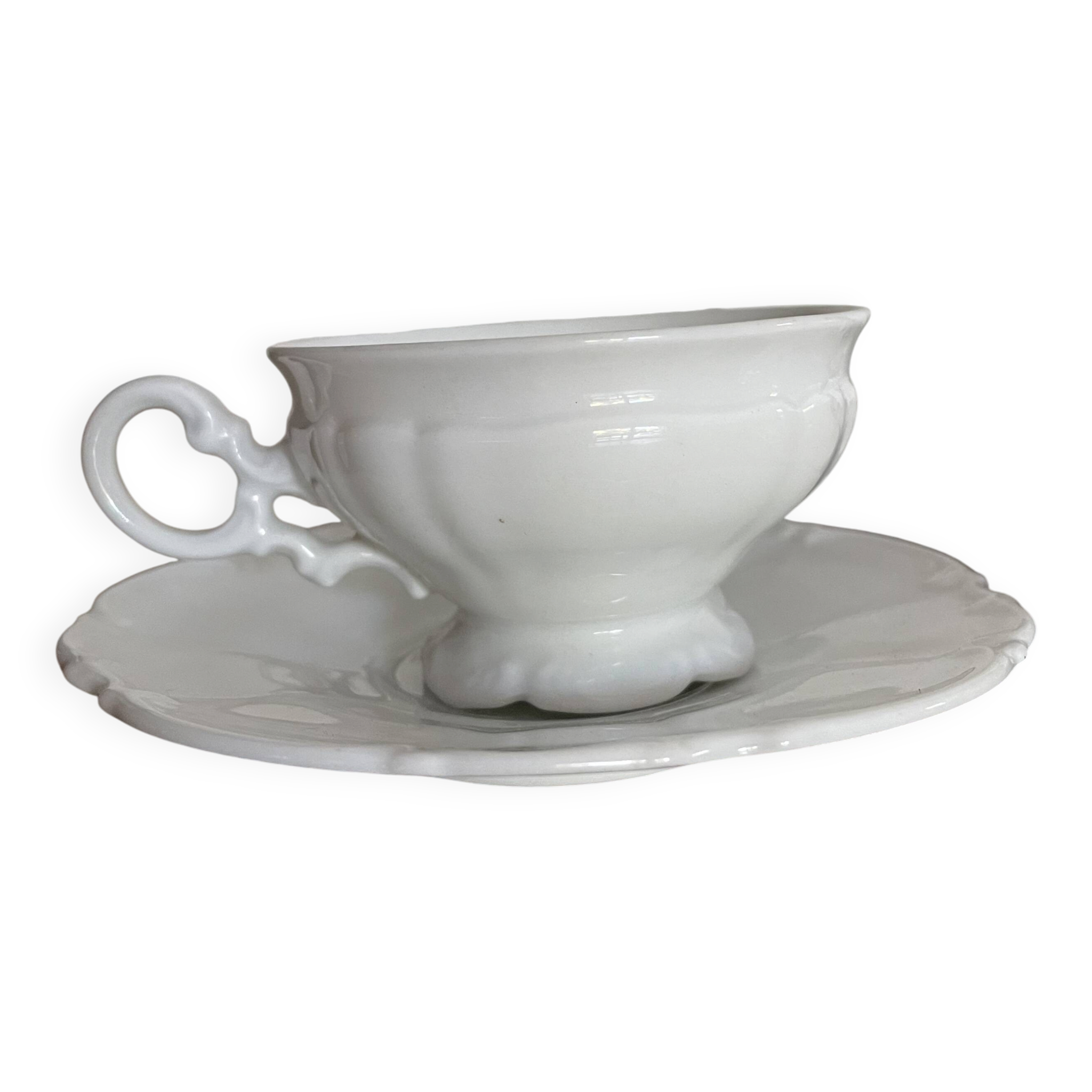 Set of 4 Hutschenreuther fine porcelain cups and saucers.