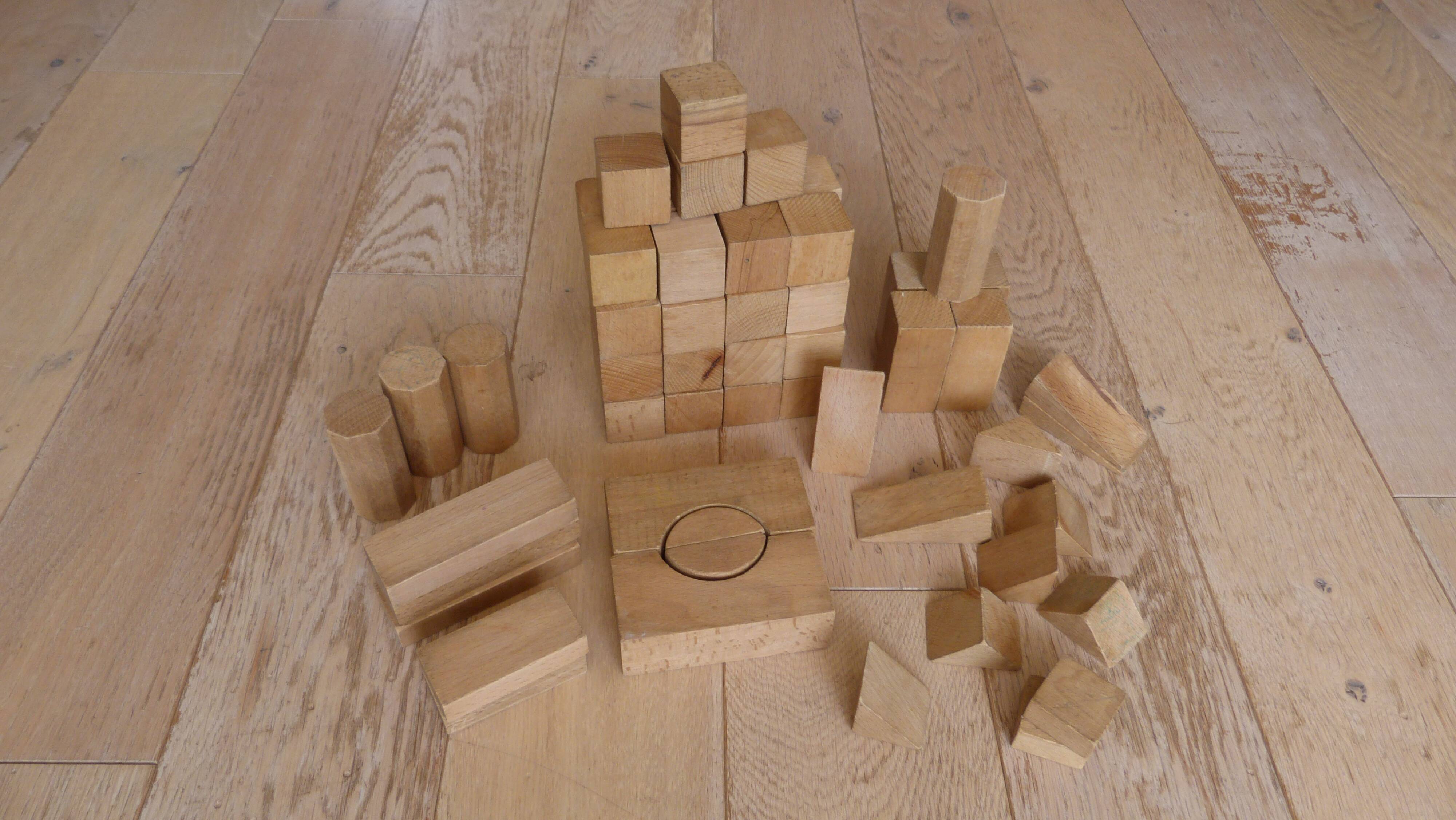 Old raw wood construction game in its cart