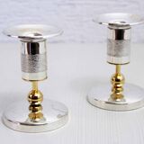 Pair of silver metal candlesticks
