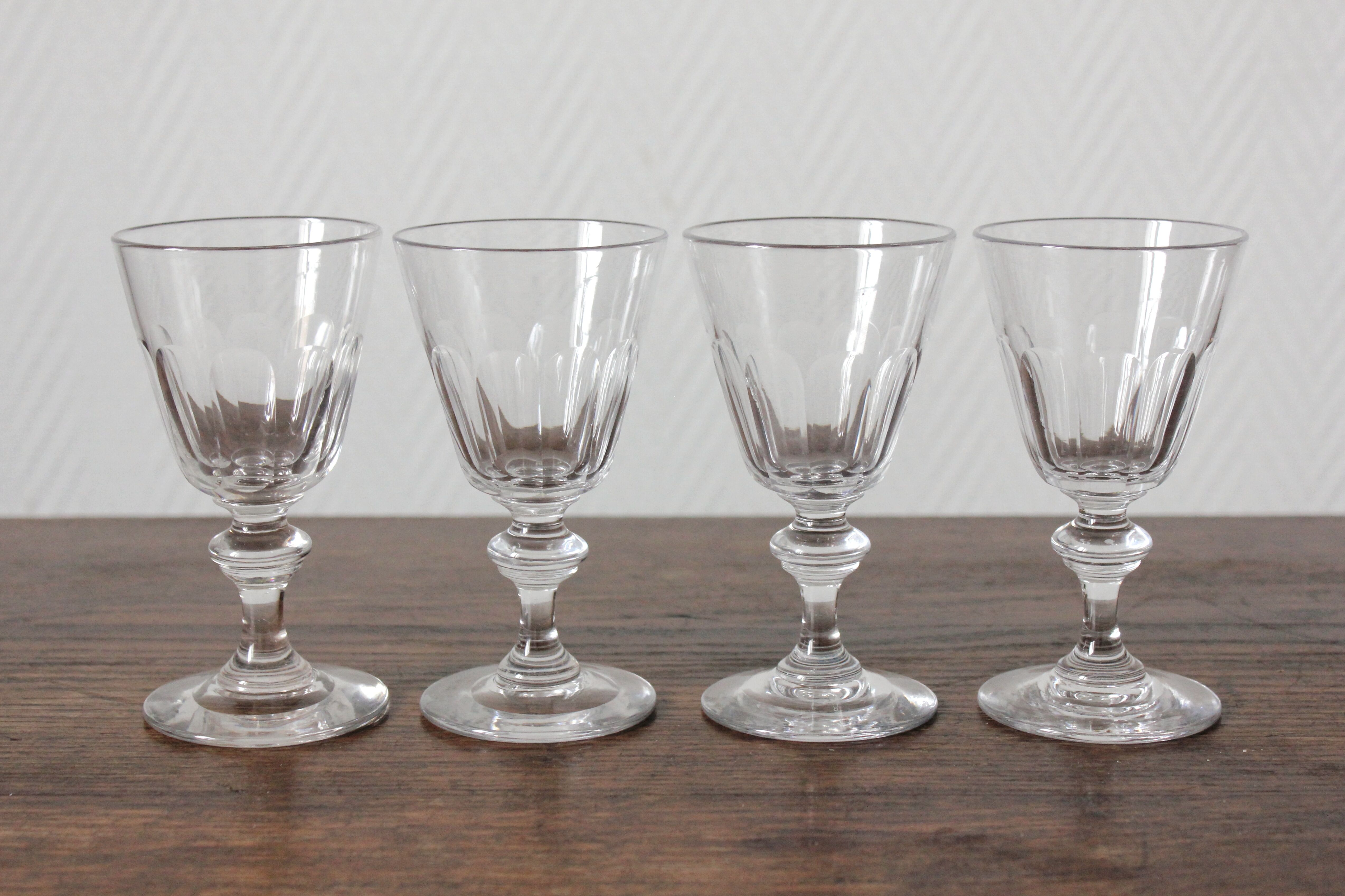 4 glasses with white wine in crystal ringing the nineteenth
