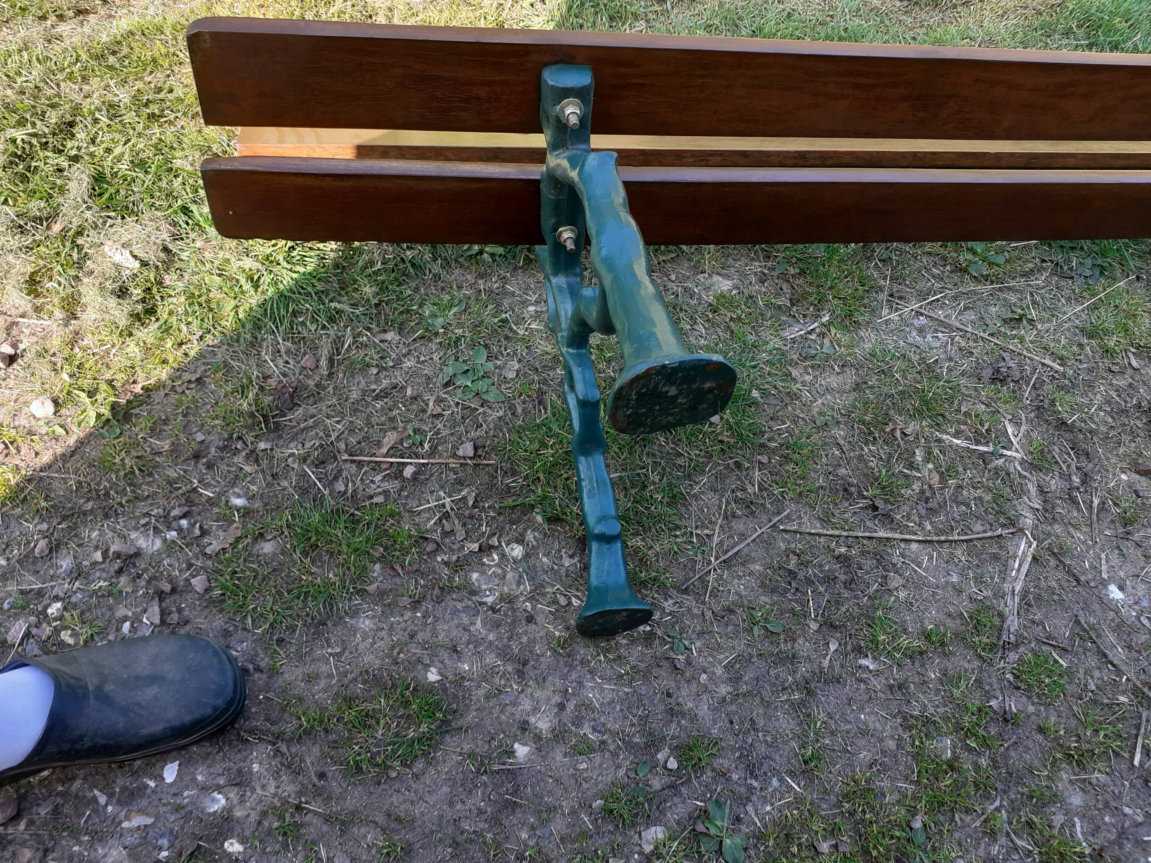 Old garden bench with cast iron feet