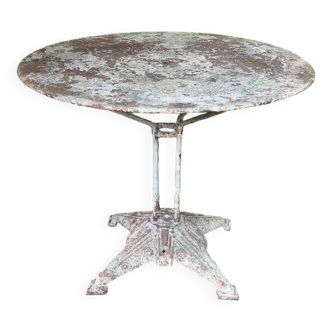 Old cast iron art-deco garden table