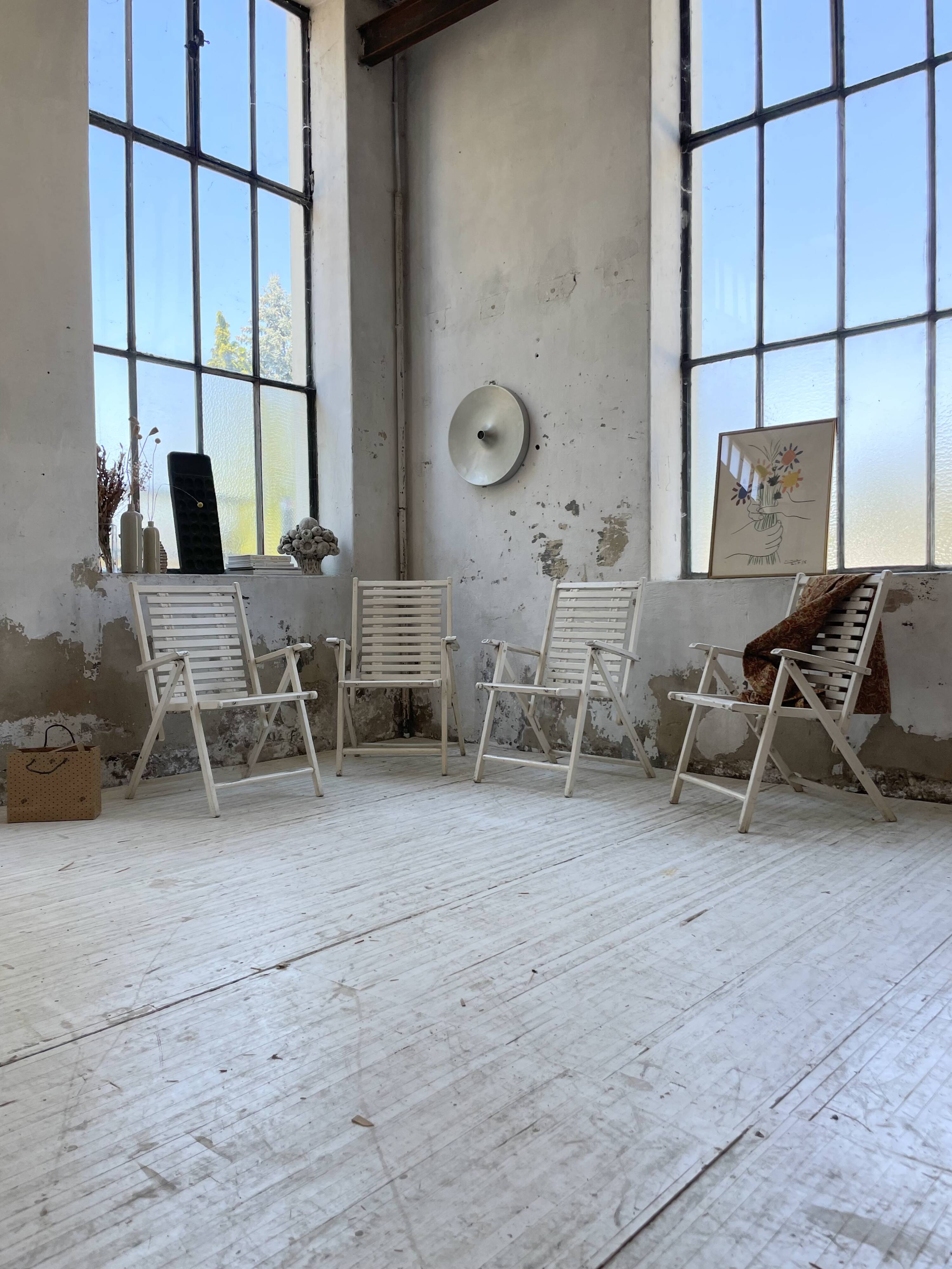 4 white wooden garden chairs