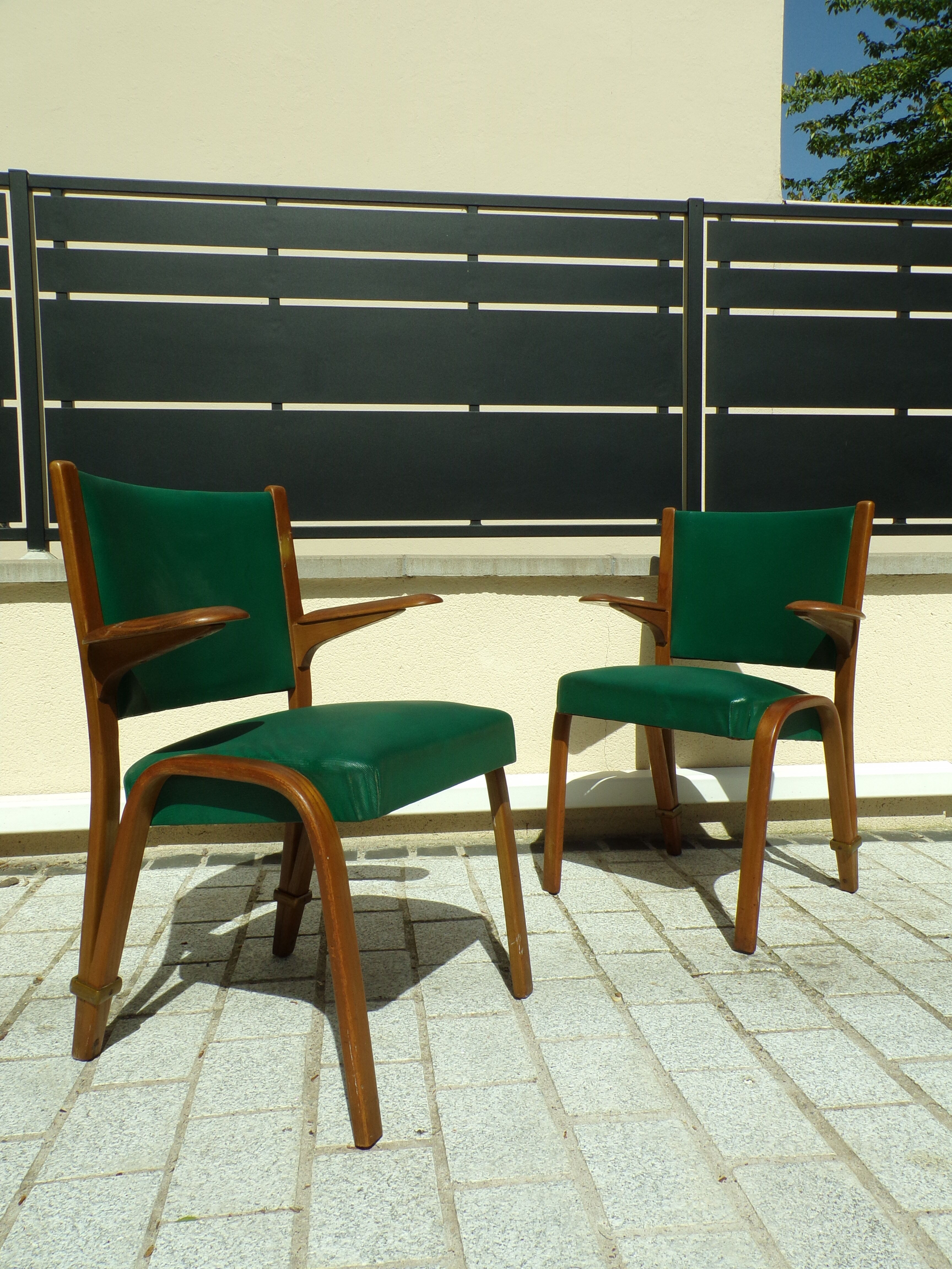 Pair of Bow Wood armchairs by Hugues Steiner