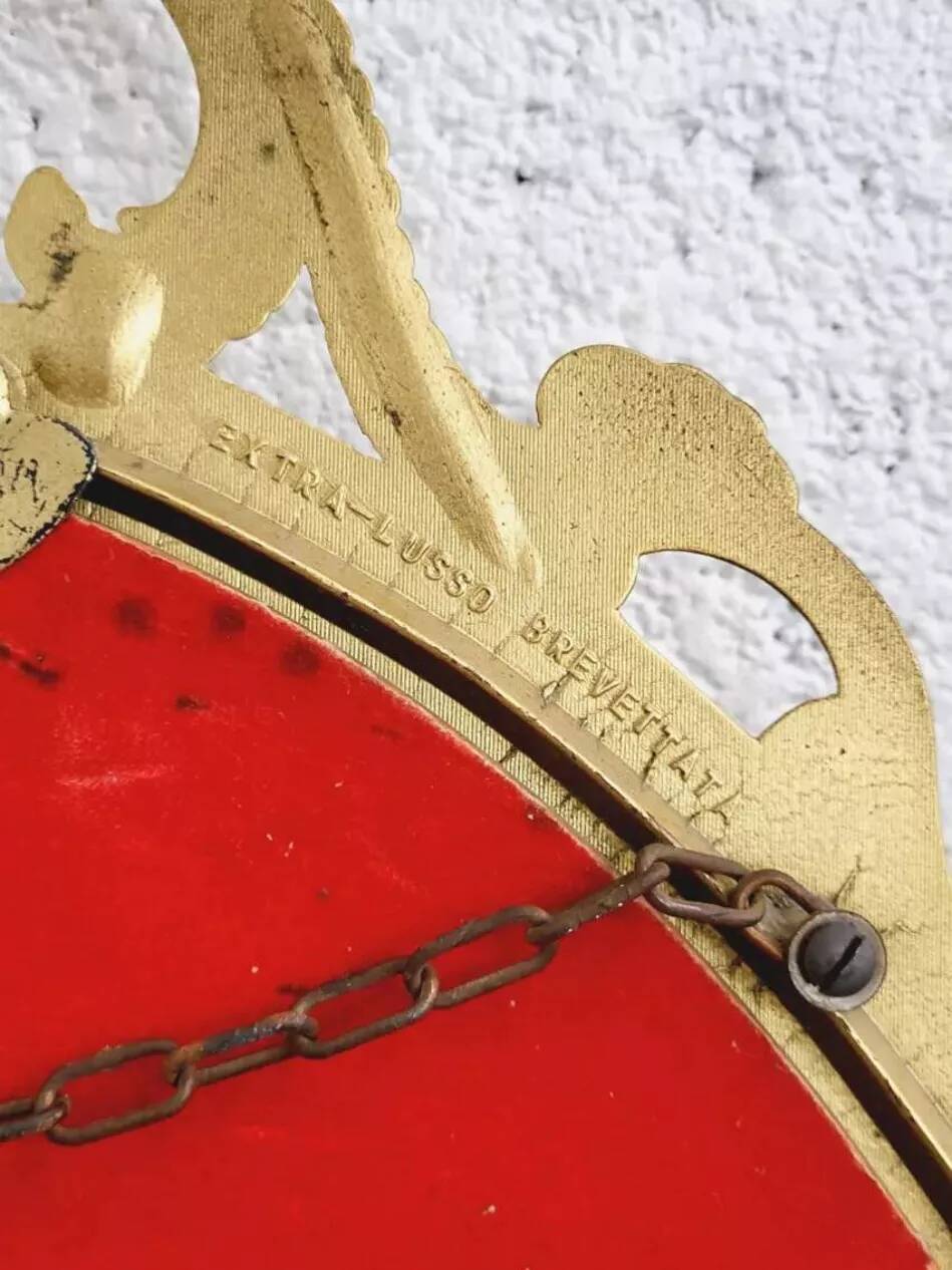 Italian oval brass medallion mirror