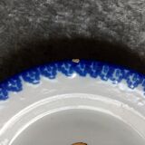 18th century earthenware decorative plate signed Saint Clement with royal coat of arms decoration