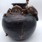 Antique Khmer ceramic vase. With elephant decoration.