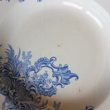 Hollow plate in earthenware decorated with flowers
