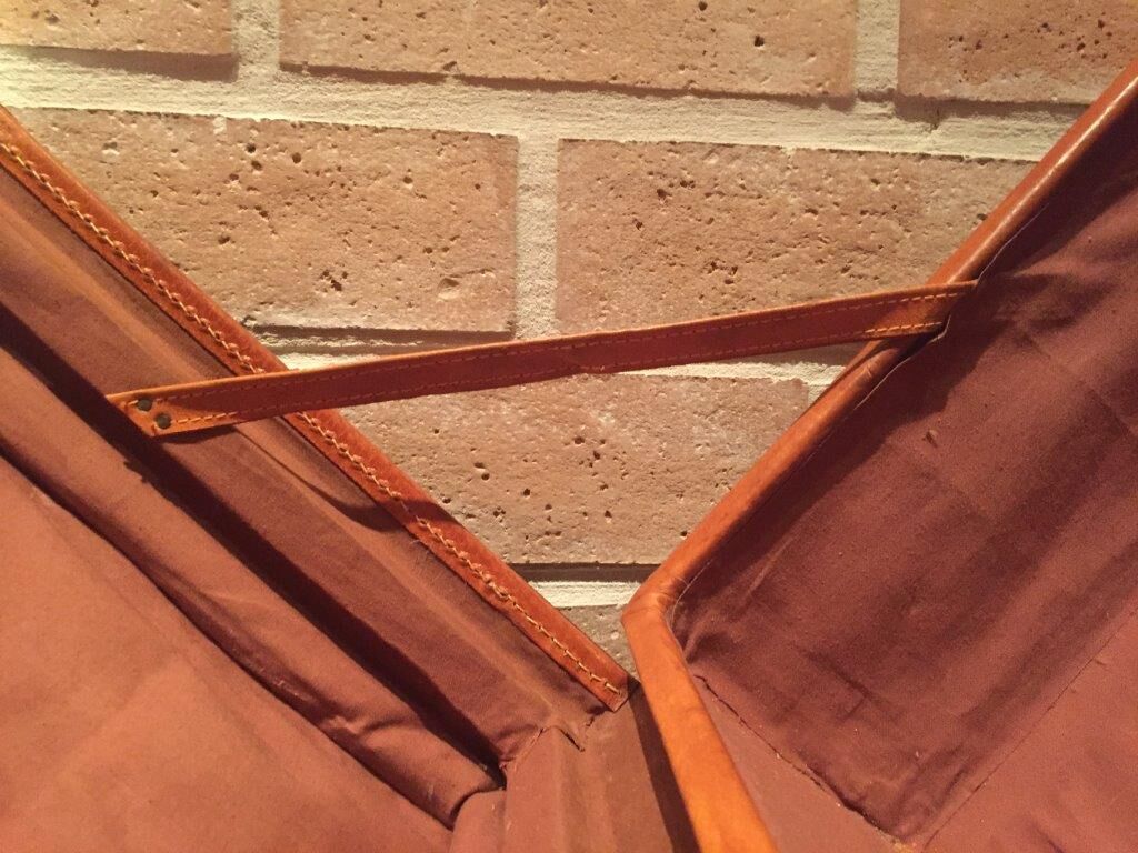 Thick leather suitcase