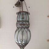 Glass suspension in cage