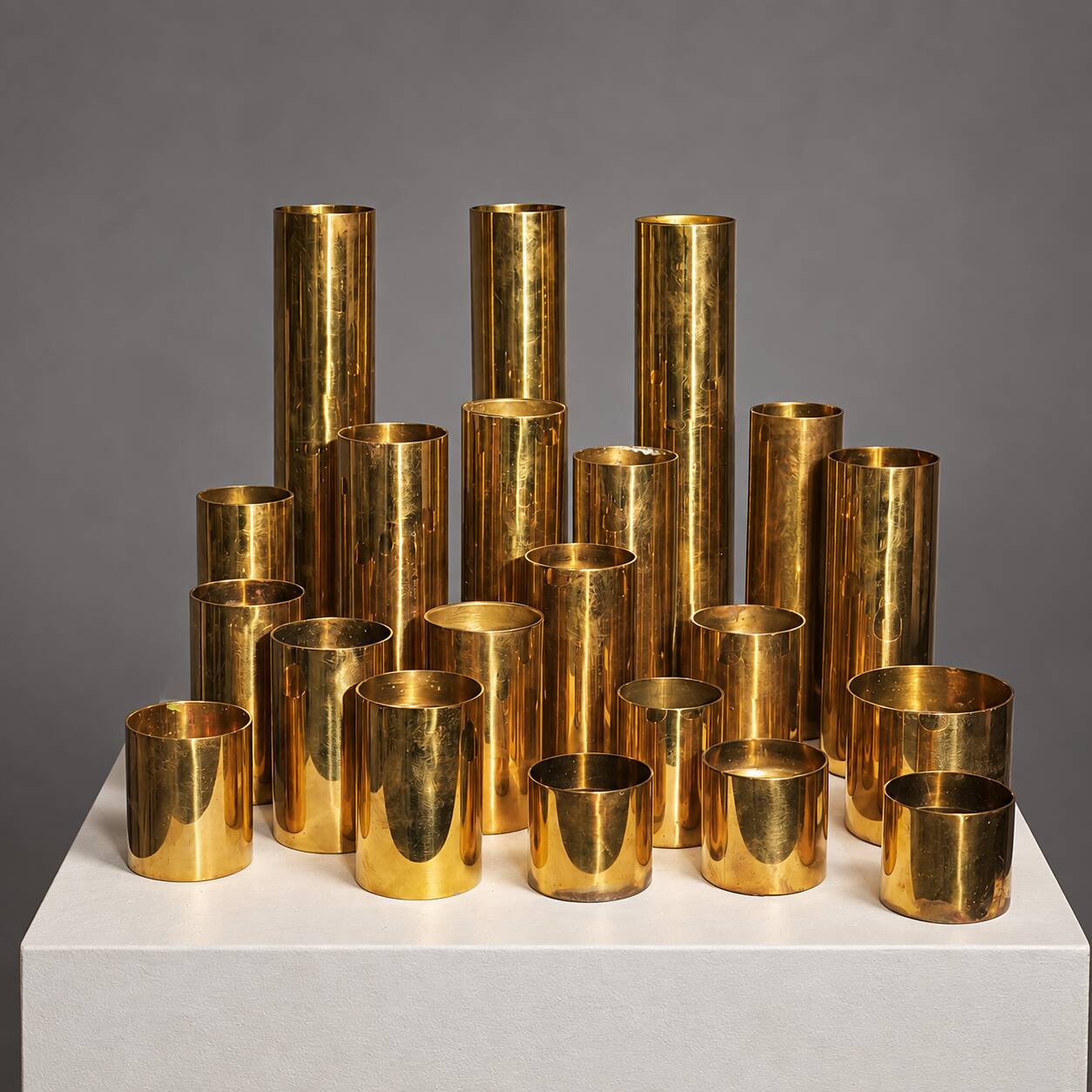 Collection of 21 modular brass candle holders — Colseth, Norway, circa 1960–70