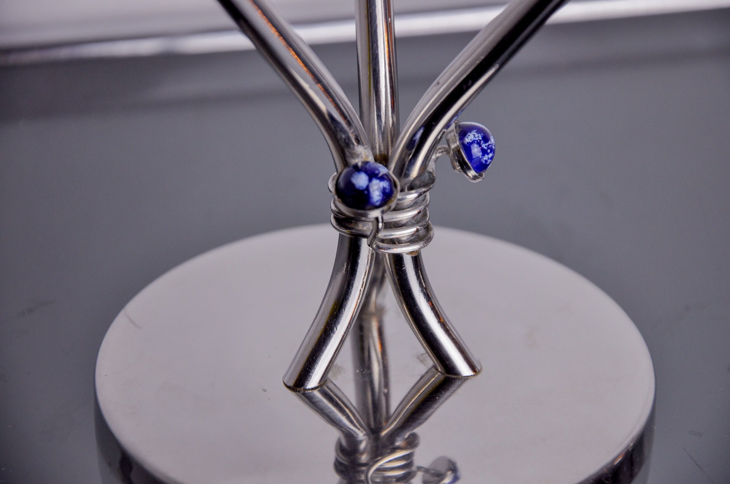 Pair of art deco candlesticks in stainless steel 3 flames and blue stones, Spain, 1970