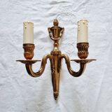French Empire-style wall sconce or chandelier in bronze with an antique gold patina.