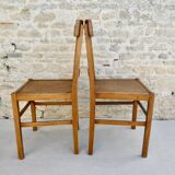 Pair of bistro chairs with perforated seat