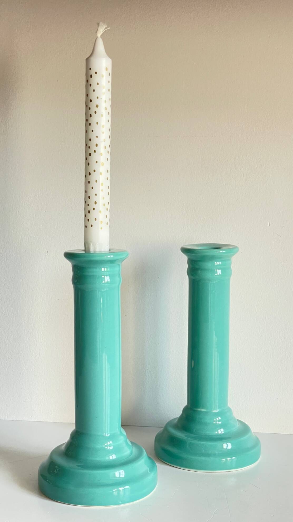 Pair of vintage ocean blue ceramic candlesticks