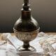 Oriental sprinkler in silver metal and brass