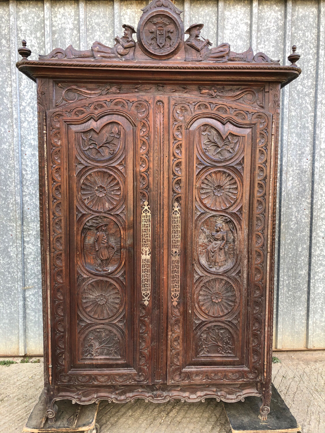 Antique Breton oak cabinet, richly carved