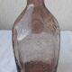 Biot bottle in bubbled glass