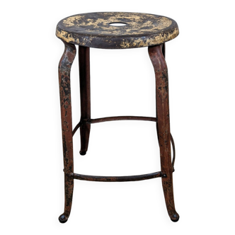 Old industrial iron stool
