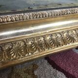 Miroir Empire à palmettes feuille d’or restauré